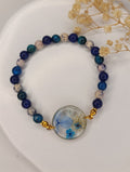 Bracelet bleu & blanc – Hortensia en résine, perles minérales & acier inox - A Fleur d'Or